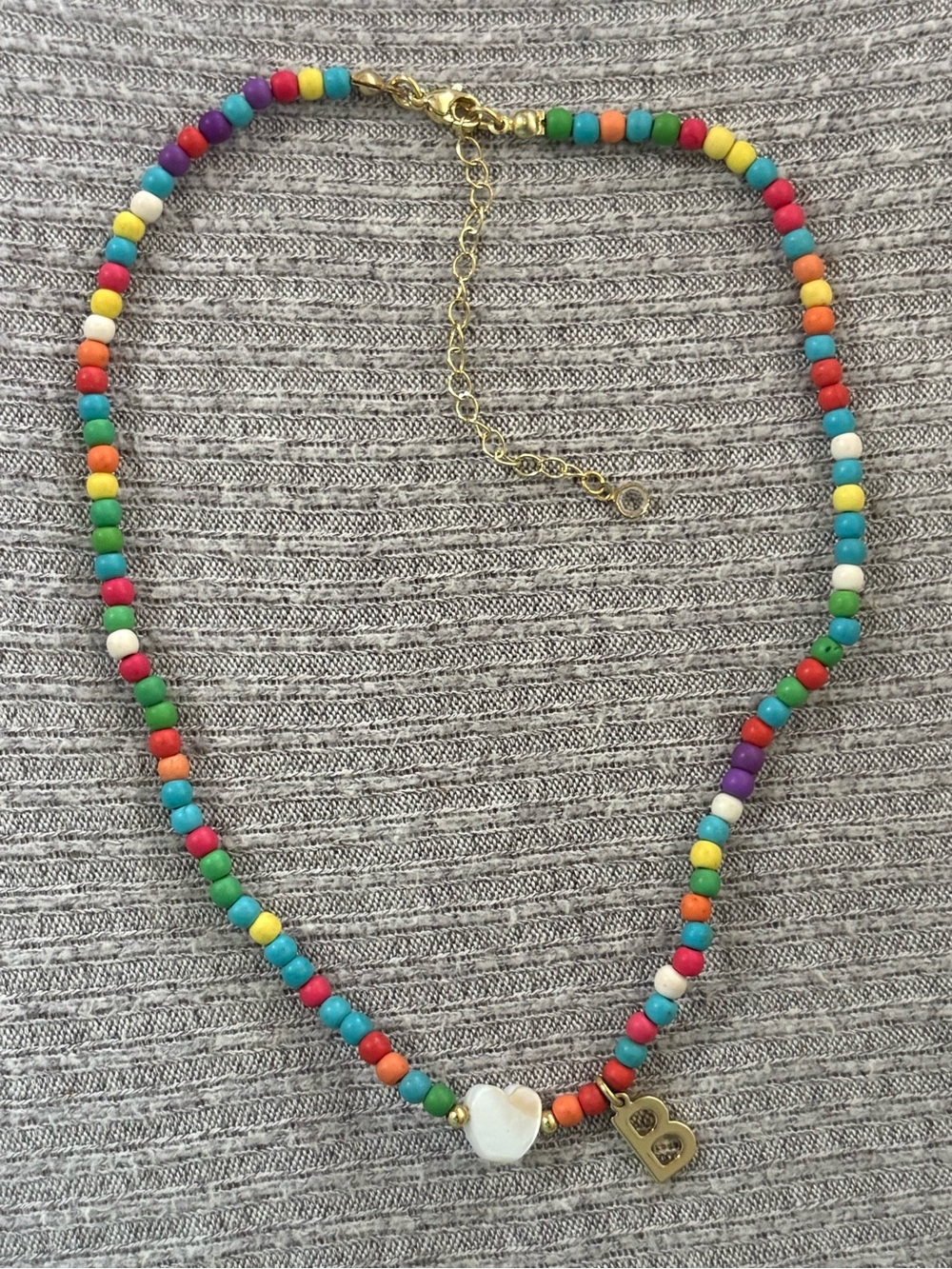Multicolored beaded necklace w shell heart charm & gold tone initial B